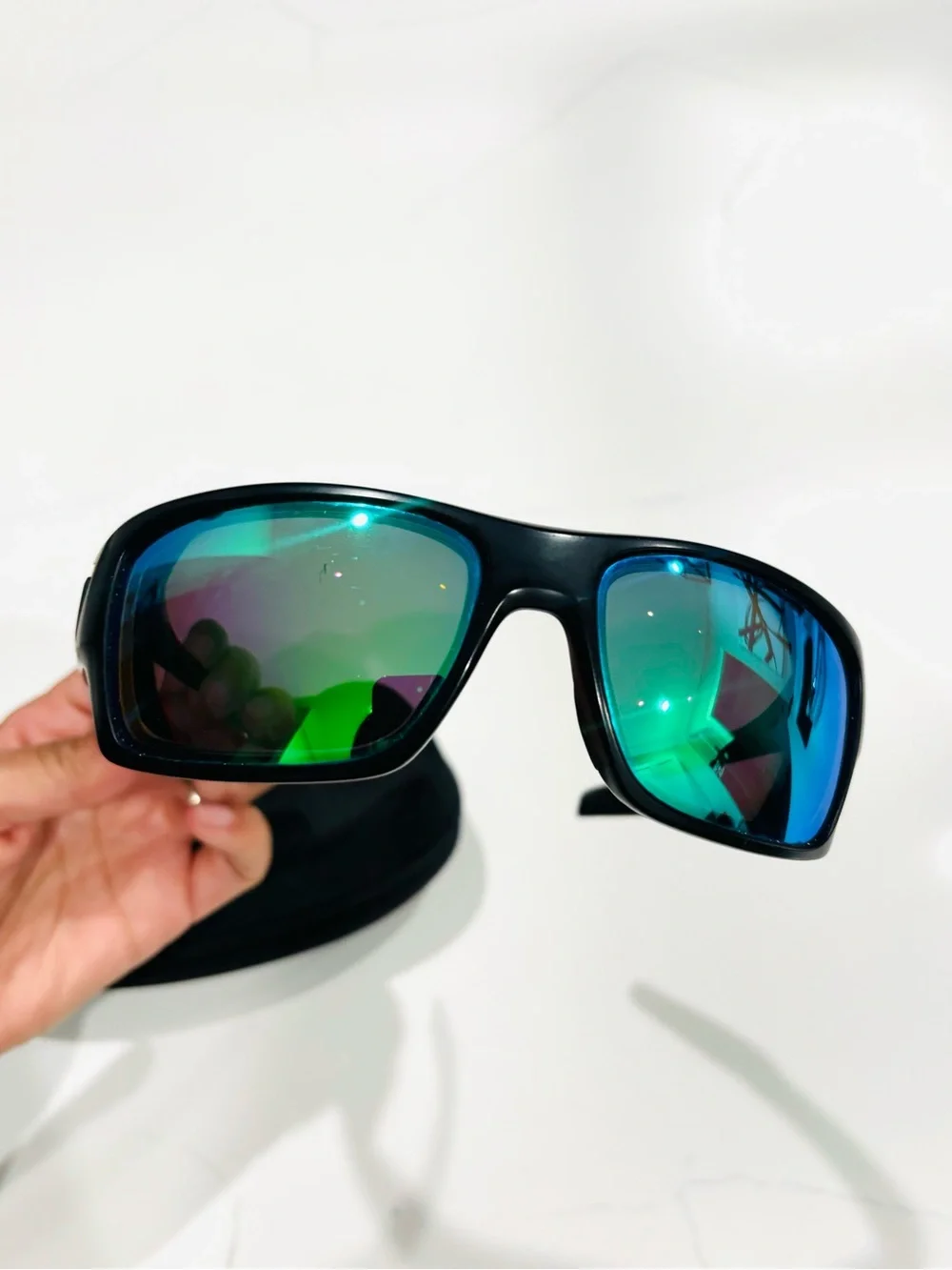 Oakley Black Frame Sunglasses with Green-Blue Mirrored Lenses